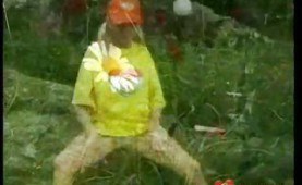 Teen toying in the garden