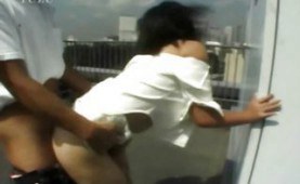 Asian couple fucking on the rooftop