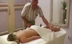 Old guy fucks a babe on the massage table