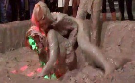 Kinky girls having a mudfight