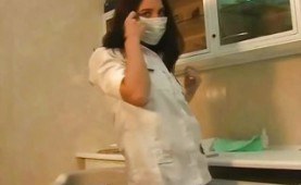 Nurse strips and toys herself