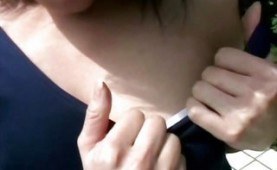 Asian cutie teasing at the poolside