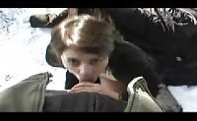 Amateur fingering herself and giving head in the snow