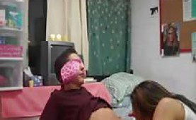 Two college girls giving a guy a blowjob