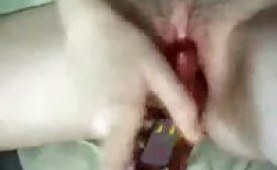 Amateur chick plays with a big dildo