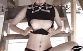 Gothic babe Liz teasing in the basement 