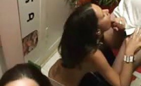 Mature chick sucking cock in a sex shop