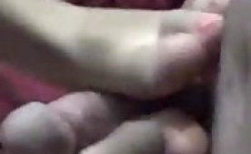 Amateur chick giving a hot footjob