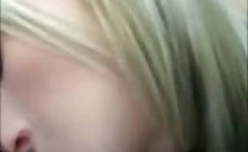 Blonde cutie giving head in a car
