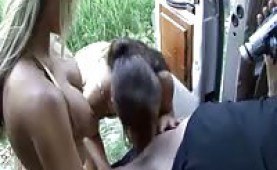 Two girls sharing a guy's cock for cash