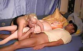 Couple have fun with a blowup doll