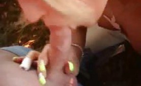 Blonde hottie giving head next to a car