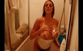 Busty Gisele taking a shower