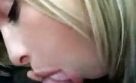 Blonde amateur sucking cock in a car