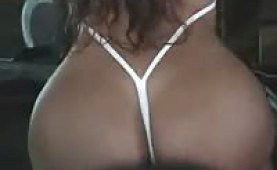 Booty latina working out in a tiny string