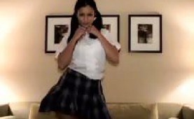 Busty Aria Giovanni strips off her schoolgirl uniform