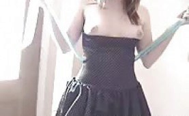 Sweet Sarah strips in front of the camera