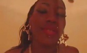 Lustful ebony babe giving head