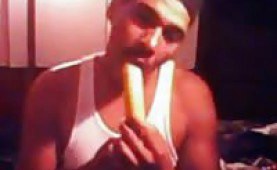 Guy gagging on his banana