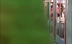 Unsuspecting busty milf filmed by a voyeur