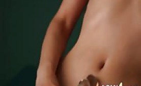 Redhead beauty playing with her dildo