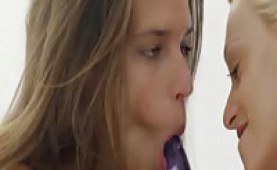 Blonde and brunette sharing their toys