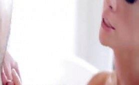 Hot blonde giving head in the bathtub