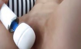 Tiny boobed coed playing with a big vibrator