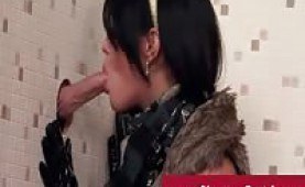 Glamour lady sucks cock through a gloryhole