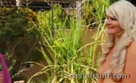 Money will turn any chick into a slut and these two babes use dildo ended golf clubs to play a game