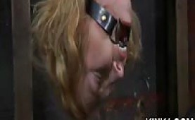 A spreader bar is all it takes to lay Nyssa out and keep her legs opened wide.