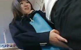 Cute asian coed plays with a cock in a store