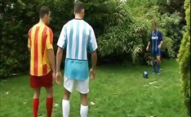 Three good looking soccer players sharing their cocks