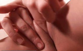 Tiny titted brunette plays with her pussy