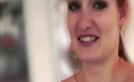 Cute redhead sucks for cash in public