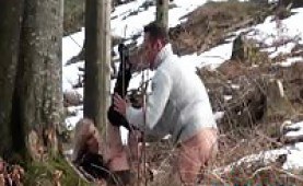 Voyeur watching a couple having sex in a snowy forest