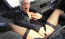 Hot blonde slut dildoing in a car