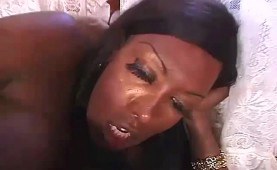 Large Black Tranny fucks pussy