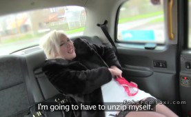 Blonde gives a flash in girl fake taxi