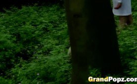 Dark hairy college girl gives bj to old fellow in woods