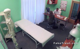 medical man pulls out sex dildo from patients pussy