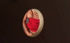 Masturbating while giving BJ on gloryhole