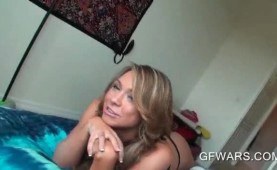 Arousing blonde strips and teases cock in POV