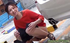 Weird asian pisses street
