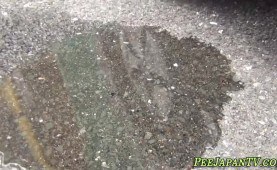 Bizarre asian slut peeing in public