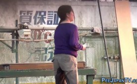 Japanese whore peeing in park