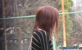 Watched asian skank pees in public