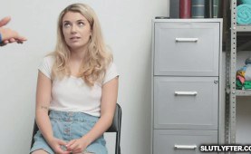 Abby on her knees sucking the officer