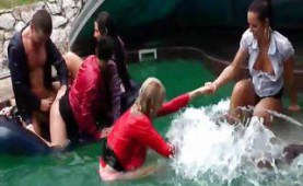 Dressed sex orgy in the pool