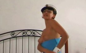 Sailor girl masturbating on bed